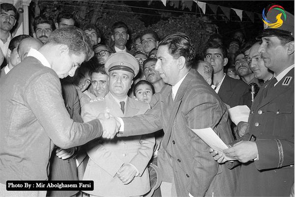 Gholamreza Takhti after winning the championship title in National Wrestling Championship, Qazvin 1955